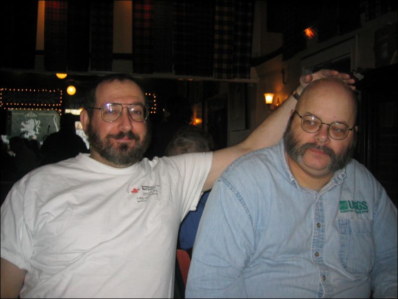 Rub the bald man's<br>head for luck!